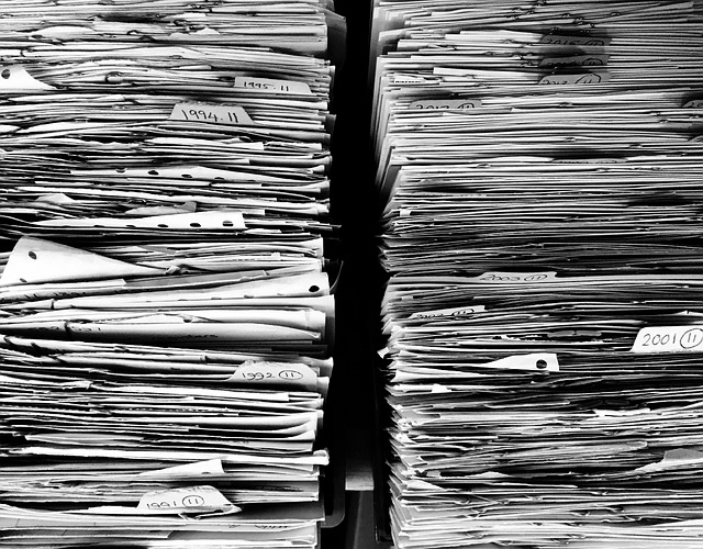 Stacks of resumes and papers